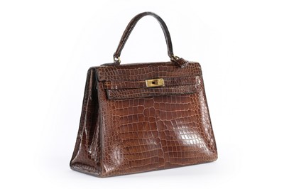 Lot 7 - An Hermès brown crocodile Kelly bag, 1962,...