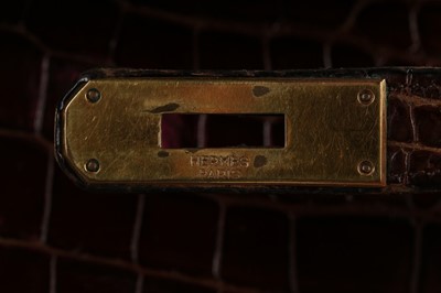 Lot 7 - An Hermès brown crocodile Kelly bag, 1962,...