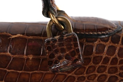 Lot 7 - An Hermès brown crocodile Kelly bag, 1962,...