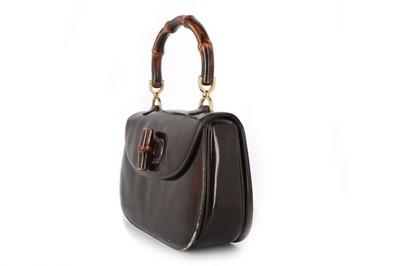 Lot 8 - A Gucci handbag with bamboo handle, 1960s,...