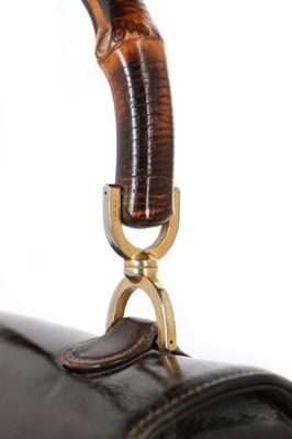 Lot 8 - A Gucci handbag with bamboo handle, 1960s,...