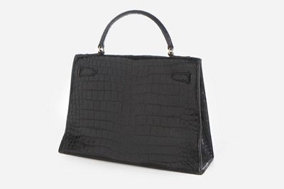 Lot 12 - An Hermès black crocodile Kelly bag, circa...