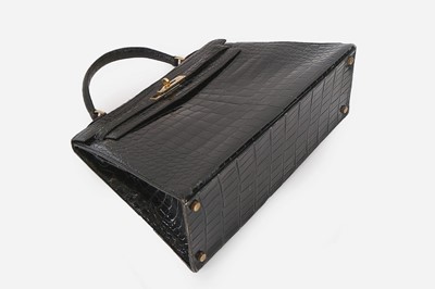 Lot 12 - An Hermès black crocodile Kelly bag, circa...