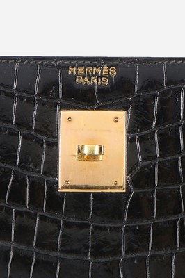 Lot 12 - An Hermès black crocodile Kelly bag, circa...