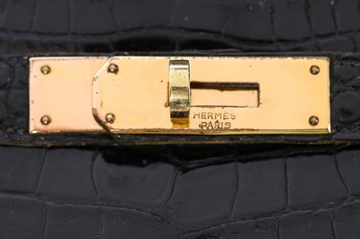 Lot 12 - An Hermès black crocodile Kelly bag, circa...