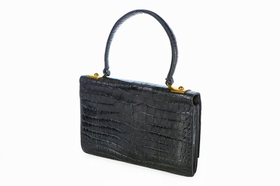 Lot 3 - An Hermès black crocodile handbag, 1960s,...