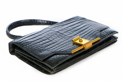 Lot 3 - An Hermès black crocodile handbag, 1960s,...