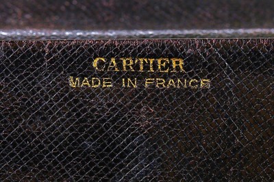 Lot 5 - A Cartier suede 'ladybird' clutch bag with 18k...
