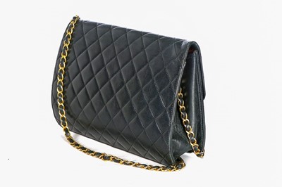 Lot 1 - A Chanel navy quilted lambskin leather flap...