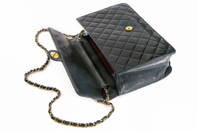 Lot 1 - A Chanel navy quilted lambskin leather flap...