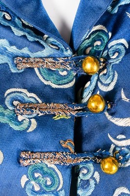 Lot 61 - A lavishly embroidered cape, altered from a...