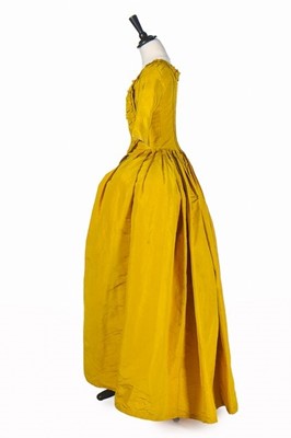 Lot 29 - A brilliant yellow silk open robe l'Anglaise,...