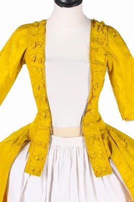 Lot 29 - A brilliant yellow silk open robe l'Anglaise,...