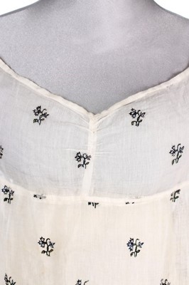 Lot 35 - A sprigged muslin dress, circa 1815,...