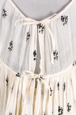 Lot 35 - A sprigged muslin dress, circa 1815,...