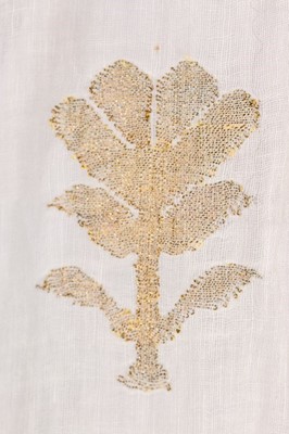 Lot 37 - A brocaded muslin evening dress, circa 1820,...
