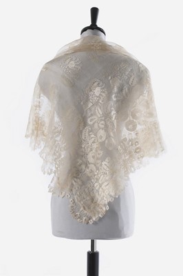 Lot 37 - A brocaded muslin evening dress, circa 1820,...
