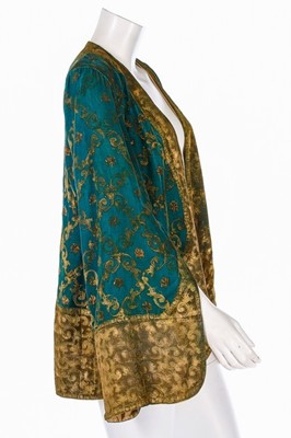 Lot 64 - A stencilled green velvet jacket, probably...