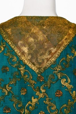 Lot 64 - A stencilled green velvet jacket, probably...