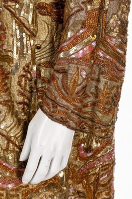Lot 65 - A gold lamé orientalist jacket, late 1920s,...
