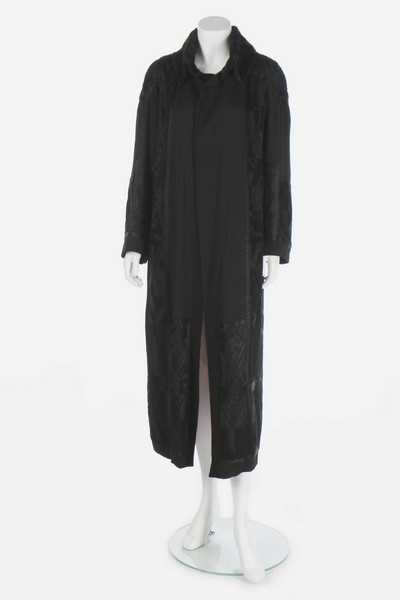 Lot 67 - A Jean Patou embroidered black crêpe coat,...