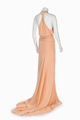 Lot 70 - A pink crêpe romaine evening ensemble,...