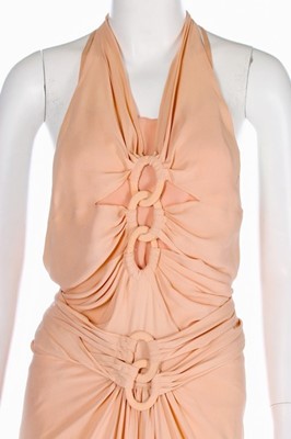 Lot 70 - A pink crêpe romaine evening ensemble,...