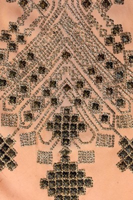 Lot 70 - A pink crêpe romaine evening ensemble,...