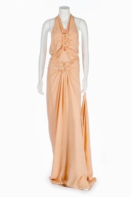 Lot 70 - A pink crêpe romaine evening ensemble,...