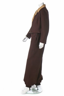 Lot 73 - A brown wool ski suit, 1930s, the jacket with...