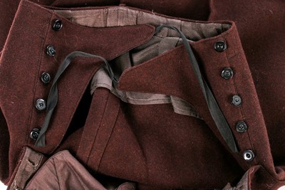 Lot 73 - A brown wool ski suit, 1930s, the jacket with...