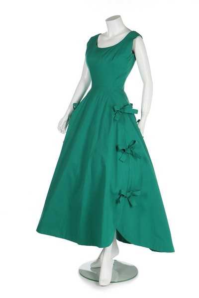 Lot 76 - A Balenciaga couture jade-green evening gown,...