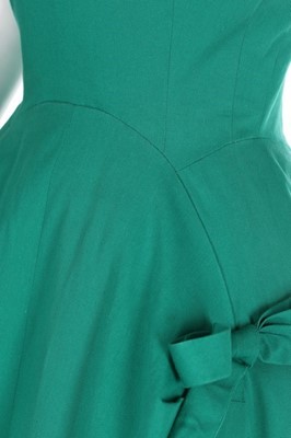 Lot 76 - A Balenciaga couture jade-green evening gown,...
