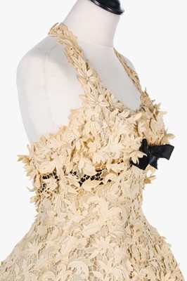 Lot 77 - A Balenciaga couture ivory guipure cocktail...