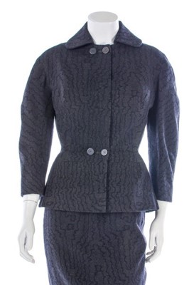 Lot 80 - A Jacques Fath couture grey wool suit, early...