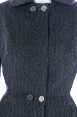 Lot 80 - A Jacques Fath couture grey wool suit, early...