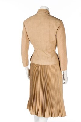Lot 82 - A Pierre Balmain couture oatmeal linen suit,...