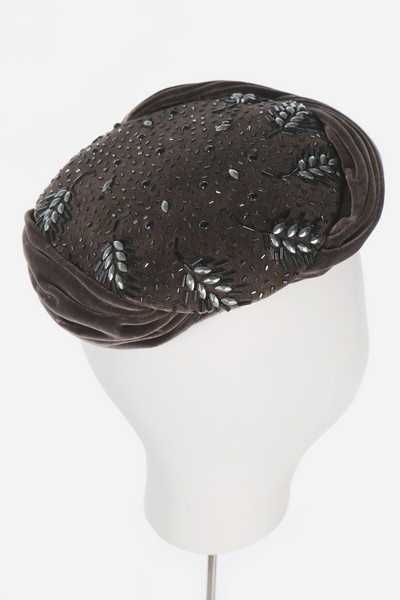 Lot 88 - Two Christian Dior hats, mid 1950s, both...