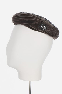 Lot 88 - Two Christian Dior hats, mid 1950s, both...