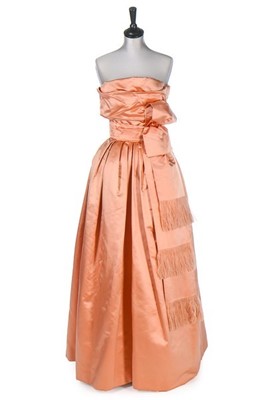 Lot 89 - A Christian Dior London salmon-pink satin ball...