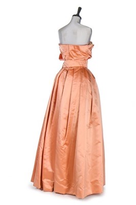 Lot 89 - A Christian Dior London salmon-pink satin ball...