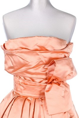 Lot 89 - A Christian Dior London salmon-pink satin ball...