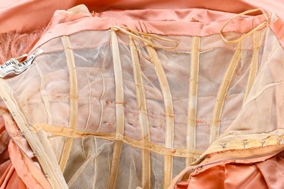 Lot 89 - A Christian Dior London salmon-pink satin ball...