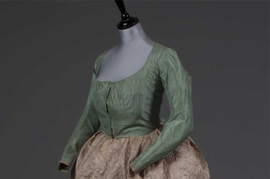 Lot 46 - A mint green taffeta bodice, circa 1780-90,...