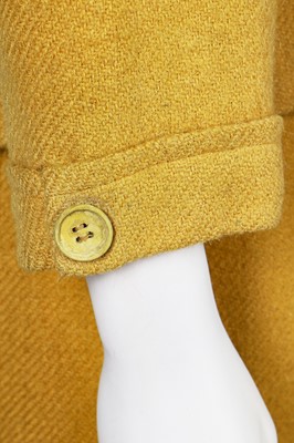 Lot 126 - A Balenciaga couture mustard tweed suit, circa 1967