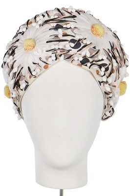 Lot 255 - A Christian Dior daisy-covered hat, early 1960s