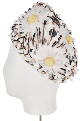 Lot 255 - A Christian Dior daisy-covered hat, early 1960s