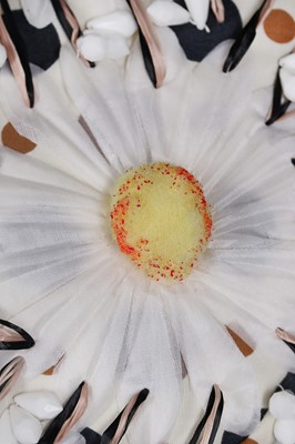 Lot 255 - A Christian Dior daisy-covered hat, early 1960s