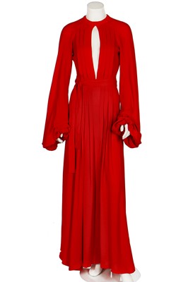 Lot 164 - An Ossie Clark red moss crêpe 'Cuddly' wrap-over dress, mid 1970s