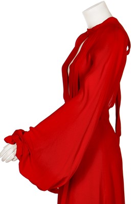 Lot 164 - An Ossie Clark red moss crêpe 'Cuddly' wrap-over dress, mid 1970s